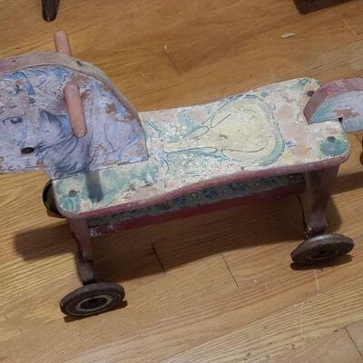 Wooden vintage rolling horse