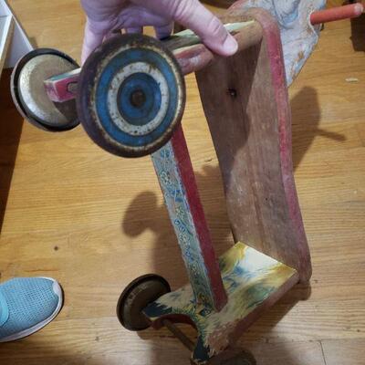 Wooden vintage rolling horse