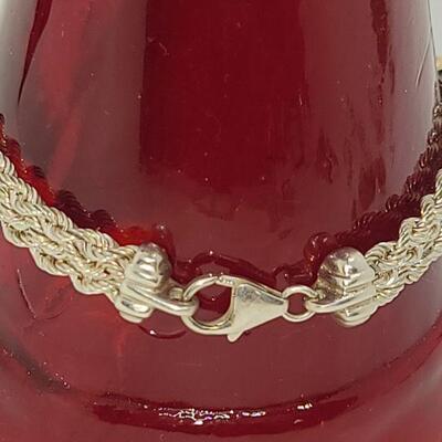 J15: 14.9g Sterling silver bracelet with 14k gold hearts signed Peru CH