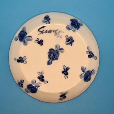 Signed hand painted ceramic teacup white with indigo blue flowers
