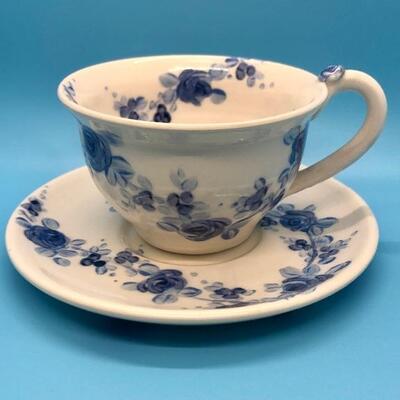 Signed hand painted ceramic teacup white with indigo blue flowers