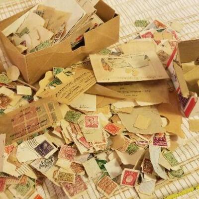 Lot #542: Huge Assortment of Hundreds of Unsorted Stamps Collection