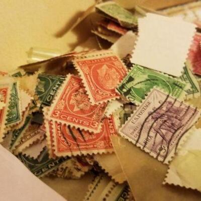 Lot #542: Huge Assortment of Hundreds of Unsorted Stamps Collection