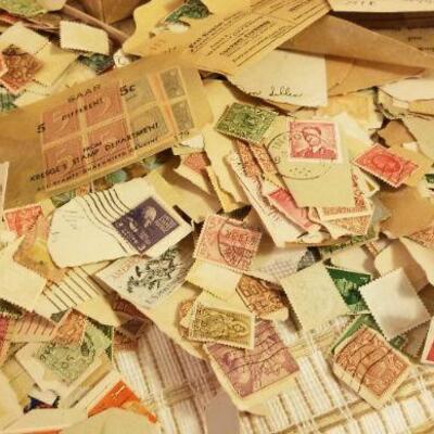 Lot #542: Huge Assortment of Hundreds of Unsorted Stamps Collection