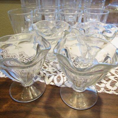 LOT 88  CLEAR GLASS WARE, PITCHERS, SHERBERT CUPS & FOUR AMBER GOBLETS