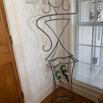 A - 560. Wrought Iron Mannequin Wine Rack