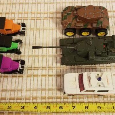 Lot #568: Large Group of Vintage Trucks and Tanks Children's Toys 