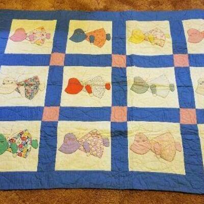 Lot #607: Antique Quilt w/ Little Girl In bonnet Theme