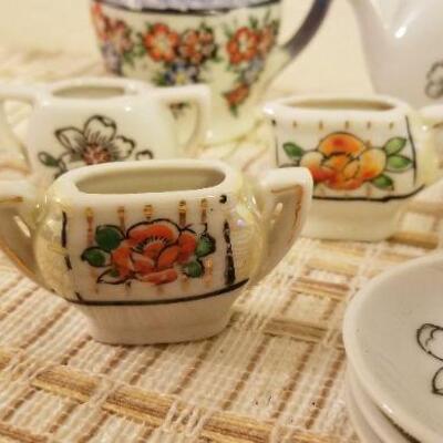 Lot #610: Large Assortment of Vintage Children's Tea set Pieces