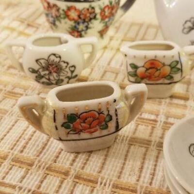 Lot #610: Large Assortment of Vintage Children's Tea set Pieces
