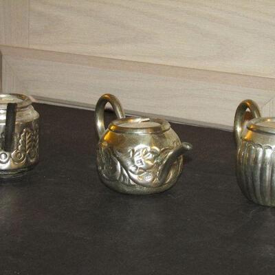 Lot 279- Teapot Candleholders