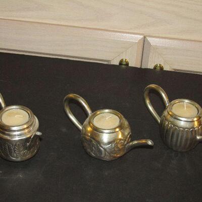Lot 279- Teapot Candleholders