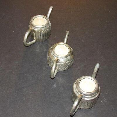 Lot 279- Teapot Candleholders