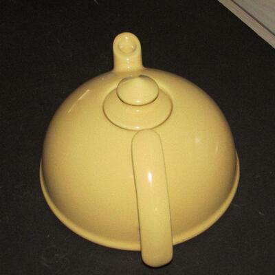 Lot 312- Large Yellow Ceramic Teapot