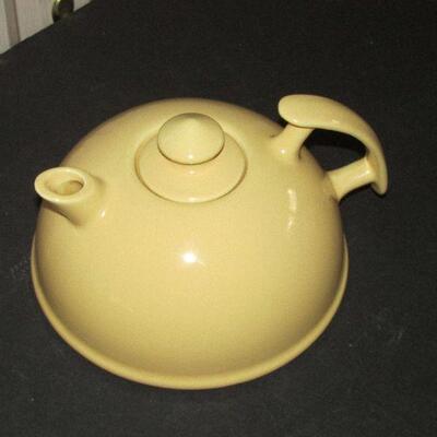 Lot 312- Large Yellow Ceramic Teapot