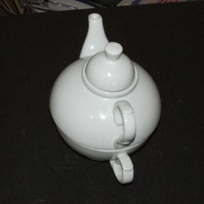 Lot 334- White World Market Teapot and Cup