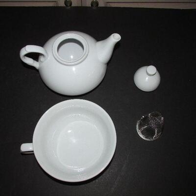 Lot 334- White World Market Teapot and Cup