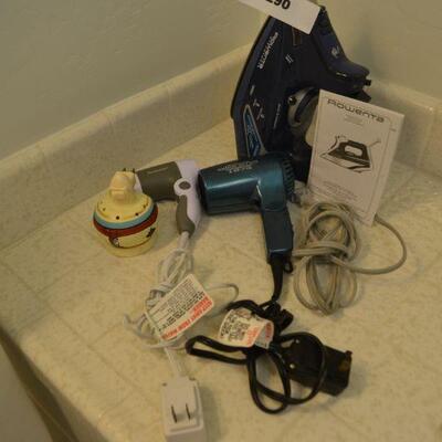 LOT 290 ROWENTA STEAMER AND IRON, PLUS HAIR DRYER AND IRONING BOARD