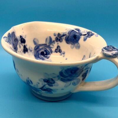 Hand-painted ceramic sugar and creamer set blue flowers on white background