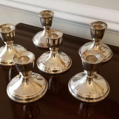 Lot #103 Six Weighted Sterling Silver Candlesticks