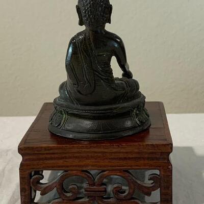 LOT 84 Small Metal Budda on Wood Stand