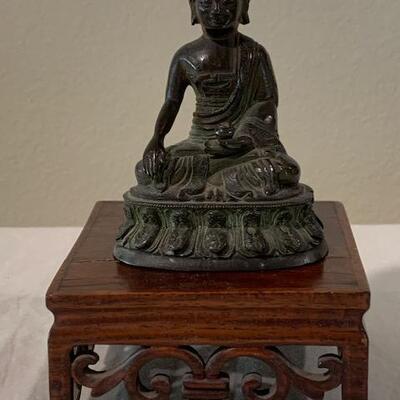 LOT 84 Small Metal Budda on Wood Stand