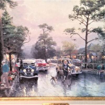 Lot #126  Thomas Kincaid piece "Carmel, Ocean Ave on a Rainy Afternoon"