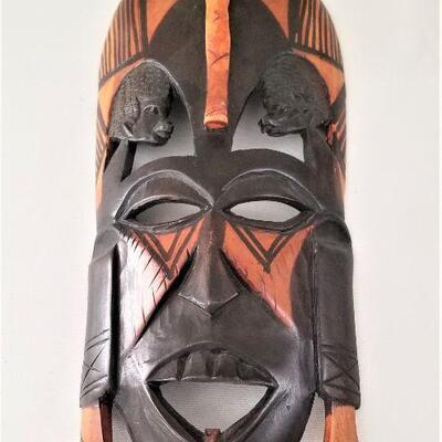 Lot #141  Pair of Carved Wooden African Masks