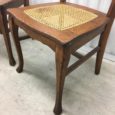 Matching Pair of Antique Oak Pressed Back Caned Seat Chairs