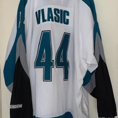 LOT 180 Mark Vlasic Jersey & Autographed Hockey Puck