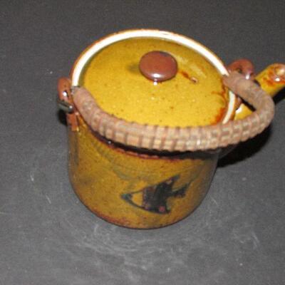 Lot 3- Brown Ceramic Teapot with Fish Design