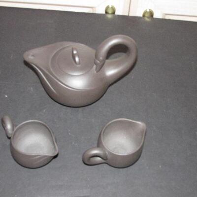 Lot 35- Swan Yixing Teapot Set