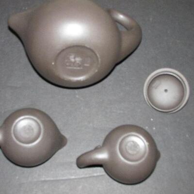 Lot 35- Swan Yixing Teapot Set