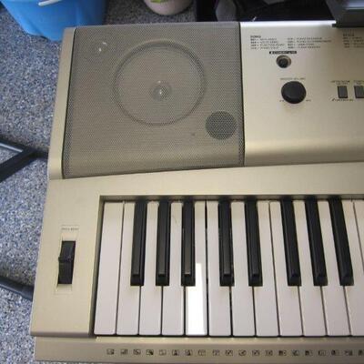 Yamaha Keyboard with stand and bench