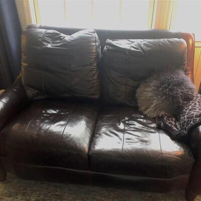 25% OFF LISTED PRICE! Leather Love Seat from Steinhafels