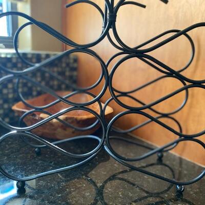 Sculptural metal wine rack