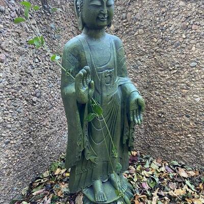 Large green standing Buddha