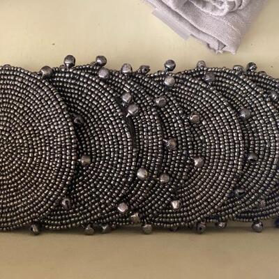 Set of six gunmetal grey beaded coasters