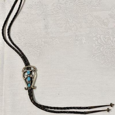 LOT 325  VINTAGE STERLING SILVER SAND CAST NAVAJO BOLO TIE