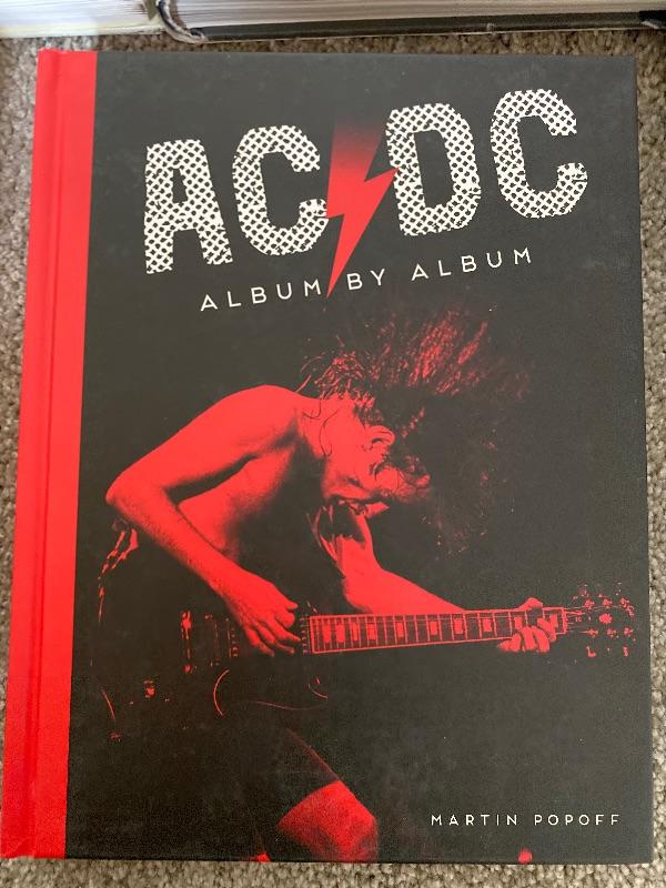 AC DC album by album hardcover | EstateSales.org