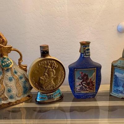 Lot of 4 Beam Bottles