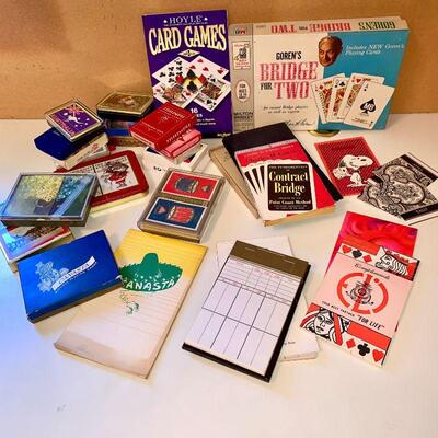 LOT 103  GROUP LOT OF PLAYING CARDS BRIDGE CANASTA SCORE BOOKS GAMES 