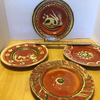 4clay pottery plates Made in Mexico ( stands not Included)
