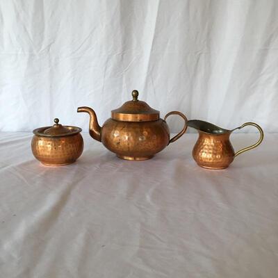 Lot 1 - Hammered Copper Tea Set
