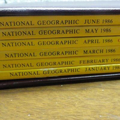 1986 National Geographic Magazine - complete set of 12 with faux leather cases Cases in great condition Books in normal good condition