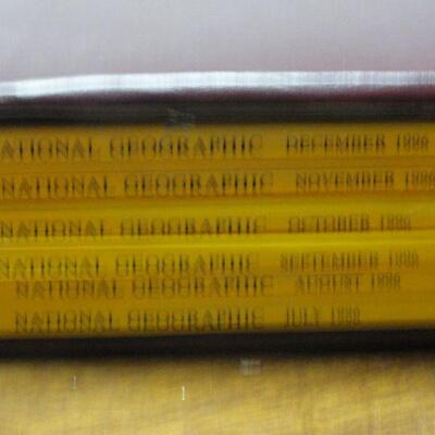 1996 National Geographic Magazine - complete set of 12 with faux leather cases Cases in great condition Books in normal good condition