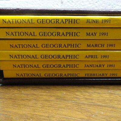 1991 National Geographic Magazine - complete set of 12 with faux leather cases Cases in great condition Books in normal good condition