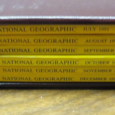 1991 National Geographic Magazine - complete set of 12 with faux leather cases Cases in great condition Books in normal good condition