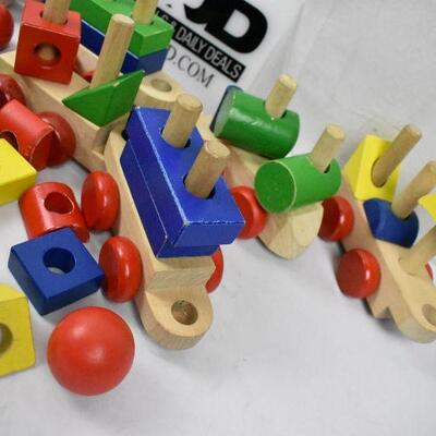 Wooden Stacking Toys. 6 trains, 1 tower, 50+ pieces