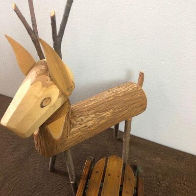 #310 SLED + A LOG DEER